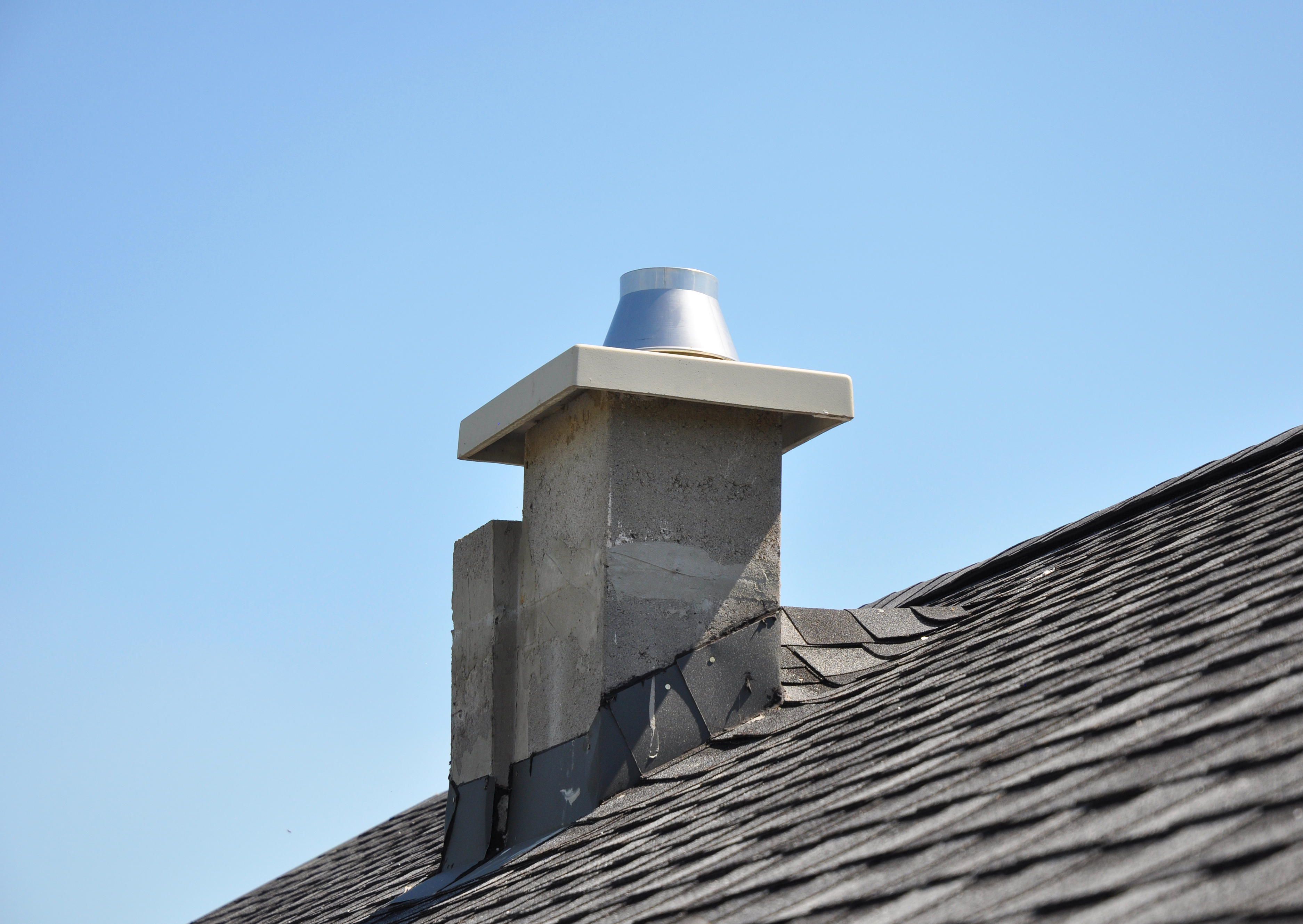 New modular ceramic chimney on the house roof.Thermocrete Chimne