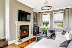 modern white living room with fireplace