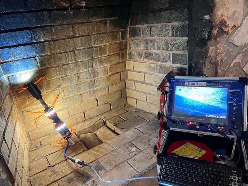 Mason's Chimney Service-Original Image of camera inspection camera inspection of fireplace