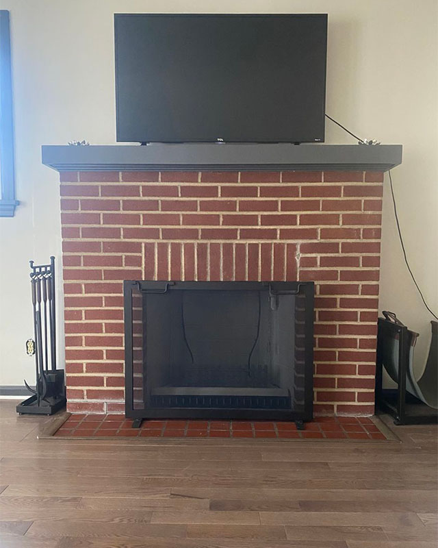 Mason's Chimney Service - Original image of Ahren-Fire A24 Ahren-Fire fireplace with brick surround
