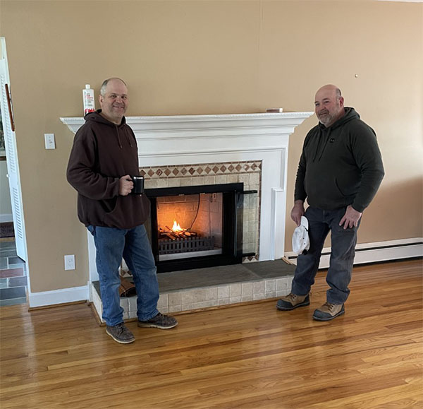 Mason's Chimney Service- Original photo of AhrenFire repair AhrenFire repair with technicians